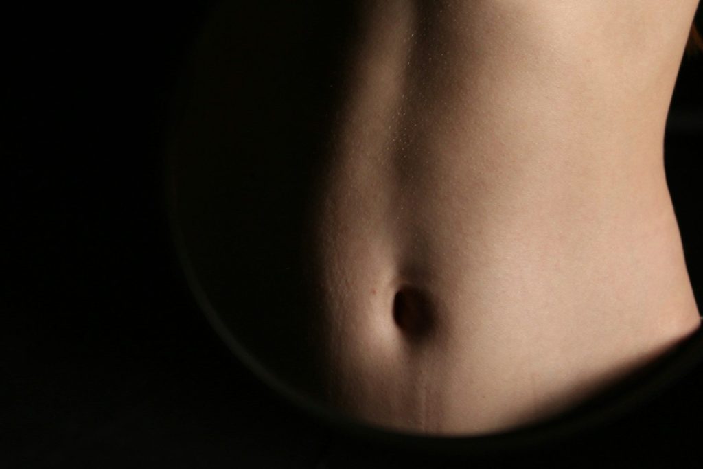 A close-up of a person's abdomen.
